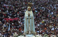 The statue of the Virgin Mary is carried
