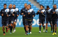 Napoli players attend a training session