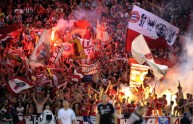 Bayern Munich’s supporters light flares