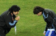 Argentina’s coach Diego Maradona (L) giv