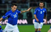 Italy’s forward Antonio Cassano (L) shoo