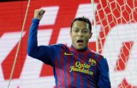 Barcelona defender Adriano (R) celebrate