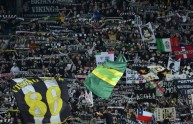 Juventus’ supporters wave their flag dur